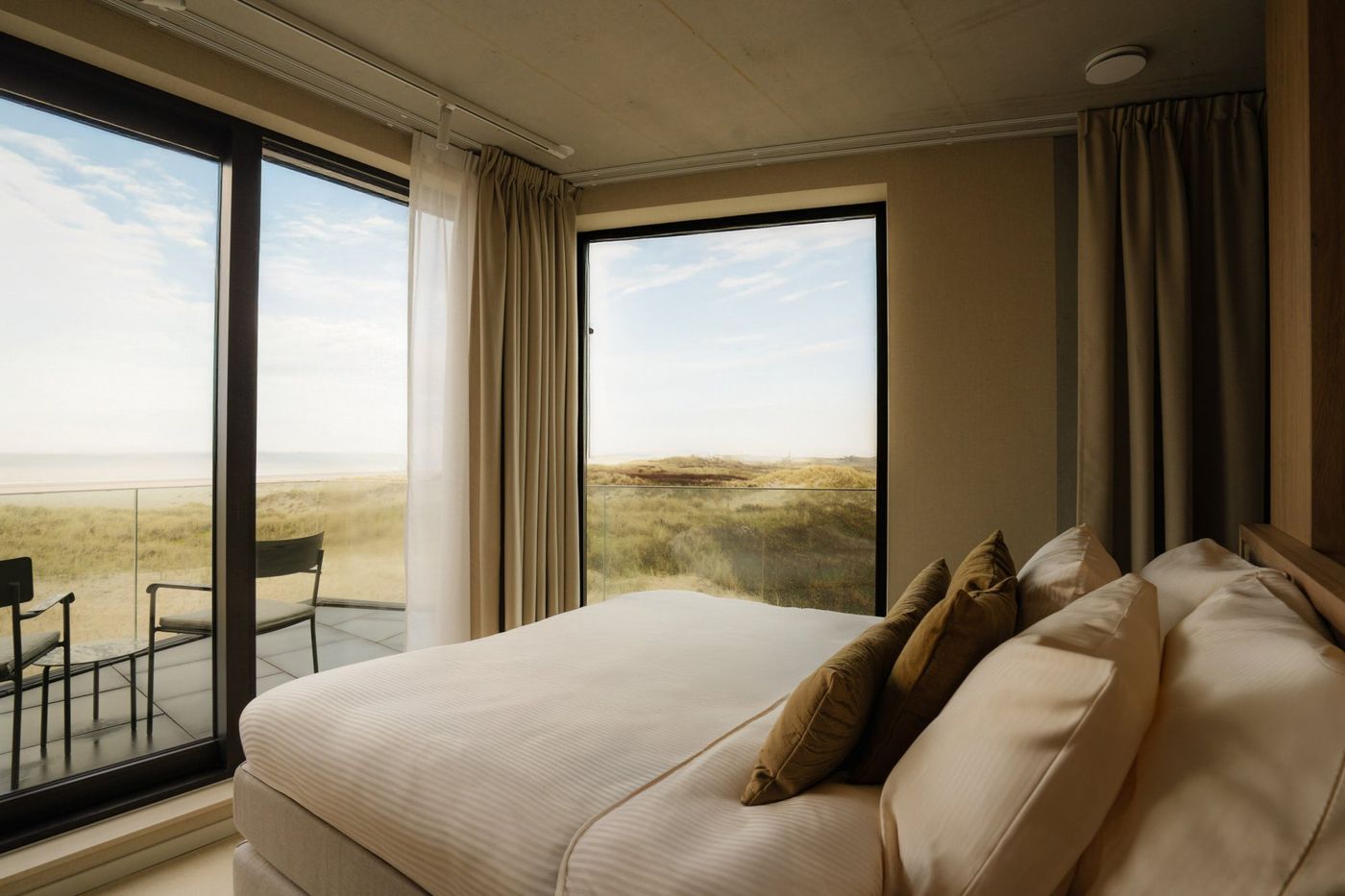 Kamer bij Hotel Elements met uitzicht over de duinen en het strand